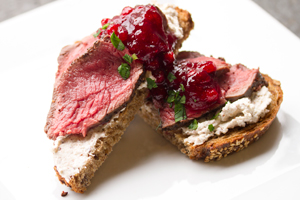 VENISON ON GRILLED BREAD WITH HAZELNUT CREME FRAICHE AND LINGONBERRY JAM
