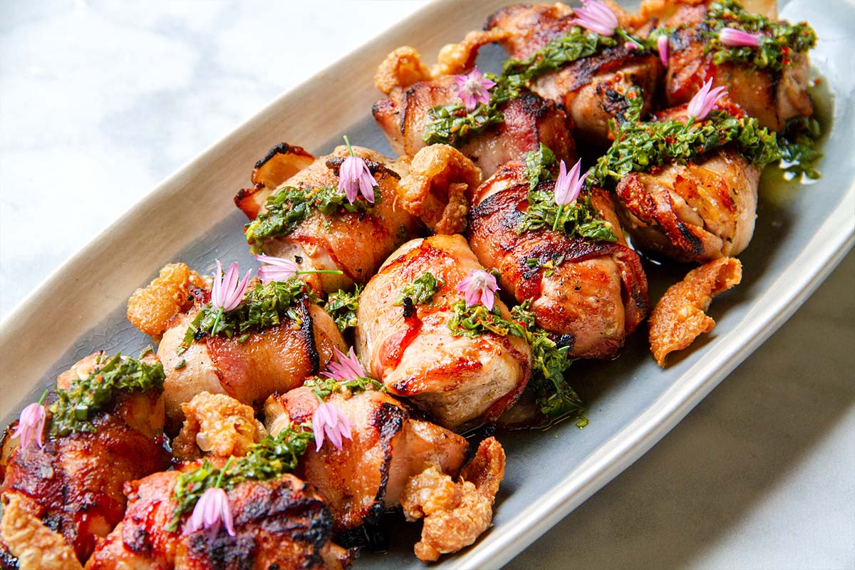 BACON-WRAPPED QUAIL BREASTS WITH HERB VINAIGRETTE & HOT HONEY
