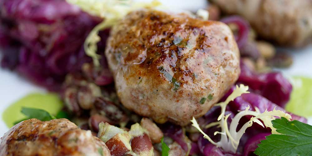 Veal Crepinettes with Green Apple Vinaigrette, Beans and Braised Cabbage