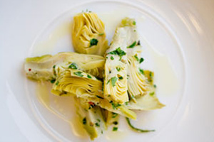 POACHED BABY ARTICHOKES WITH CHEESE & HERBS