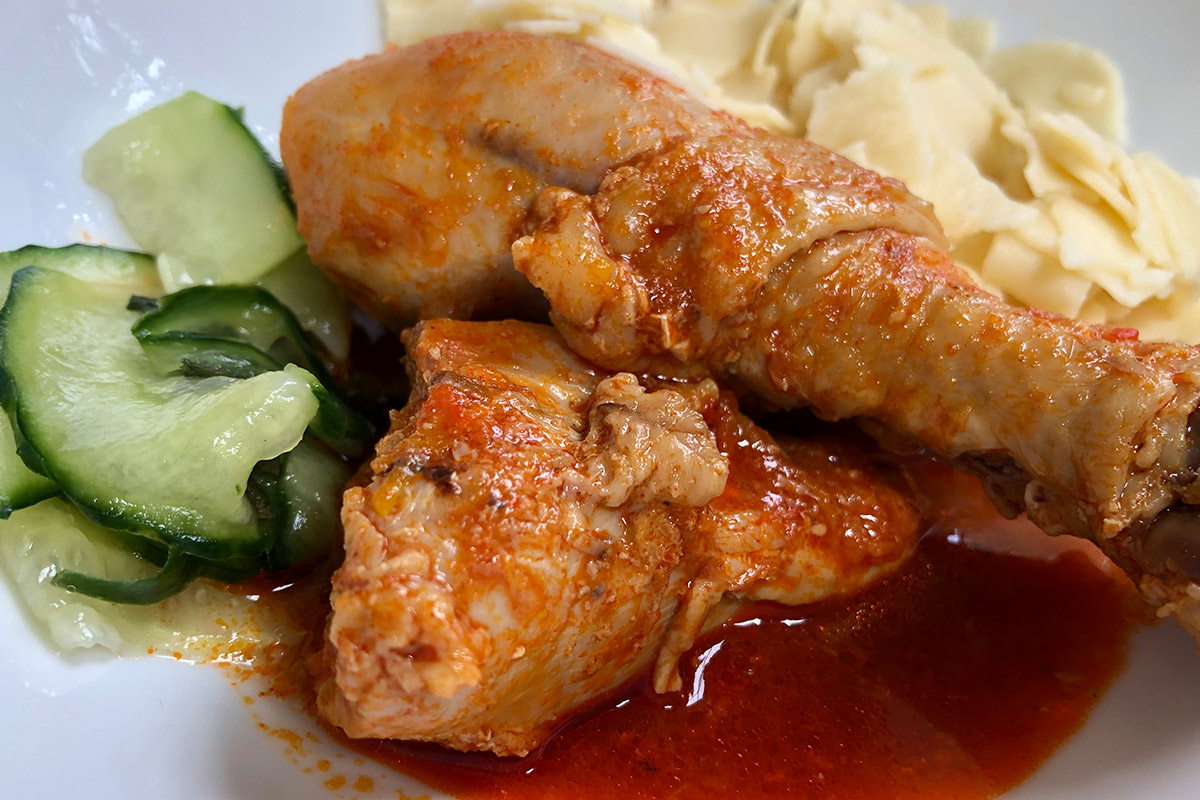 HUNGARIAN CHICKEN PAPRIKASH WITH CSIPETKE NOODLES AND CUCUMBER SALAD