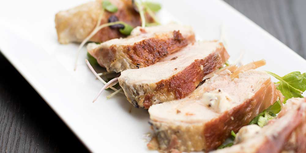 Prosciutto-Wrapped Guinea Fowl Breasts with Black Truffle Butter & Microgreen Salad