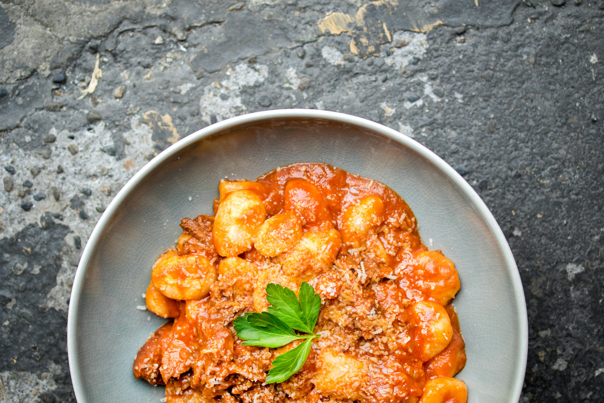 Red wine braised lamb shanks with homemade gnocchi.