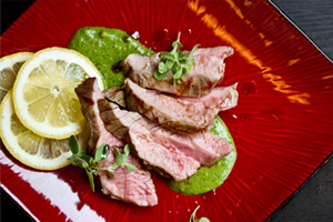 SLOW-GRILLED LAMB CHOPS WITH PEA & MINT PESTO